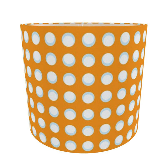 ORANGE LAMP SHADE WITH WHITE POLKA DOTS AND PALE BLUE HIGHLIGHTS